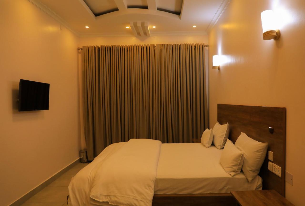 Ally Ngali Motel Кигали Экстерьер фото