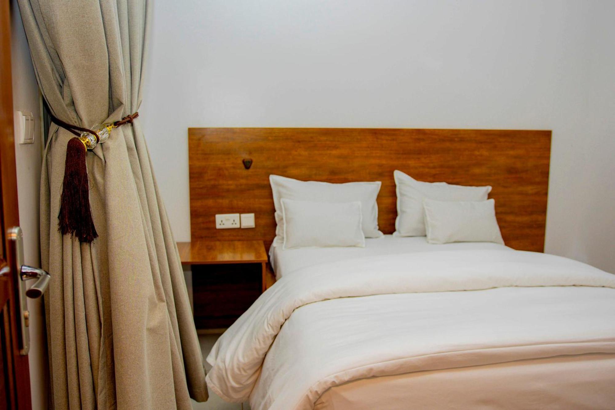 Ally Ngali Motel Кигали Экстерьер фото